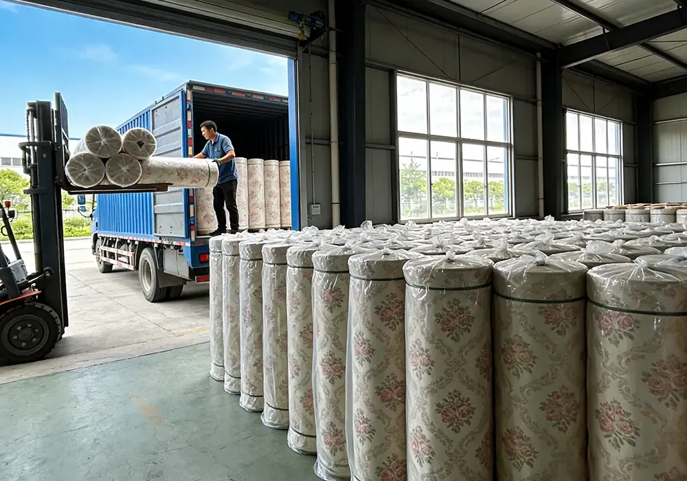 Forklift loading Baosiwei eco solvent printed floral tablecloth fabric rolls into truck for delivery — tablecloth factory localized fast-order fulfillment