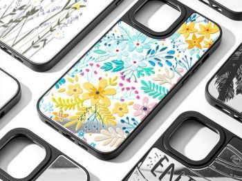 Custom phone cases printed by Baosiwei 6090 UV Flatbed Printer with high-resolution details and varnish effects