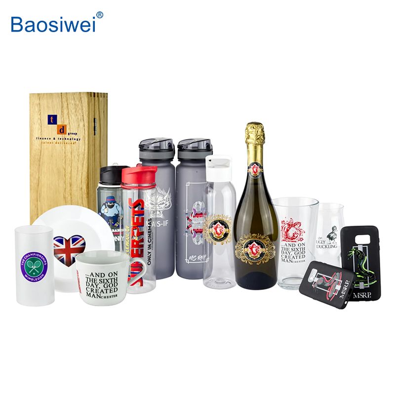 Various items including plastic bottles, glass cups, and phone cases labeled with UV DTF stickers, demonstrating Baosiwei’s versatile printing solutions for plastic, glass, and metal.