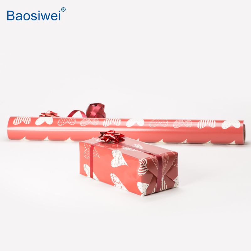 Gift box and wrapping paper with heart patterns printed by Baosiwei digital carton printer for personalized packaging