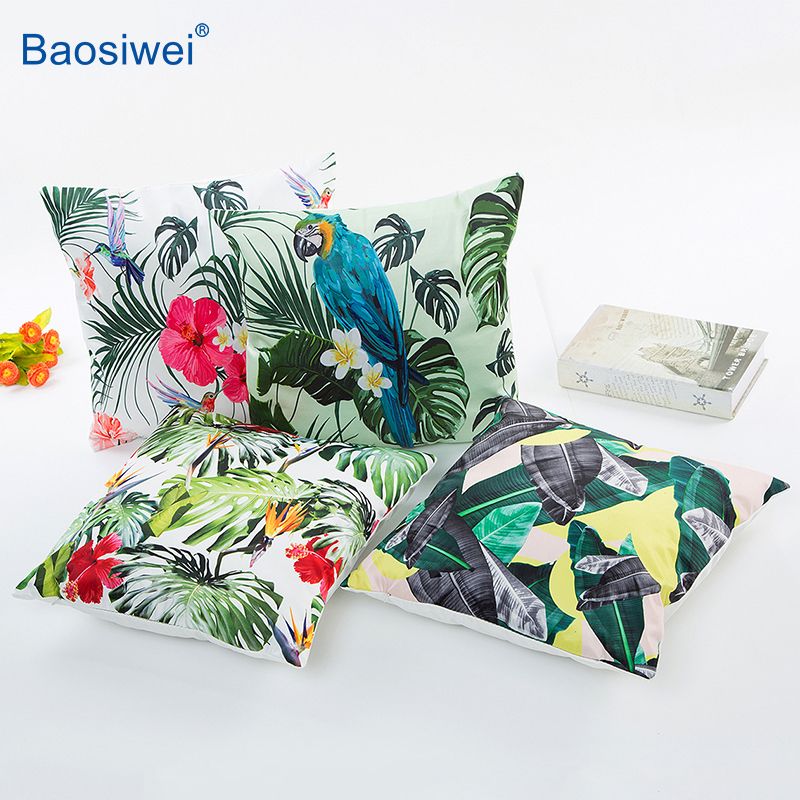 Assorted sublimation-printed cushion covers with tropical designs, ideal for bulk home textile customization.