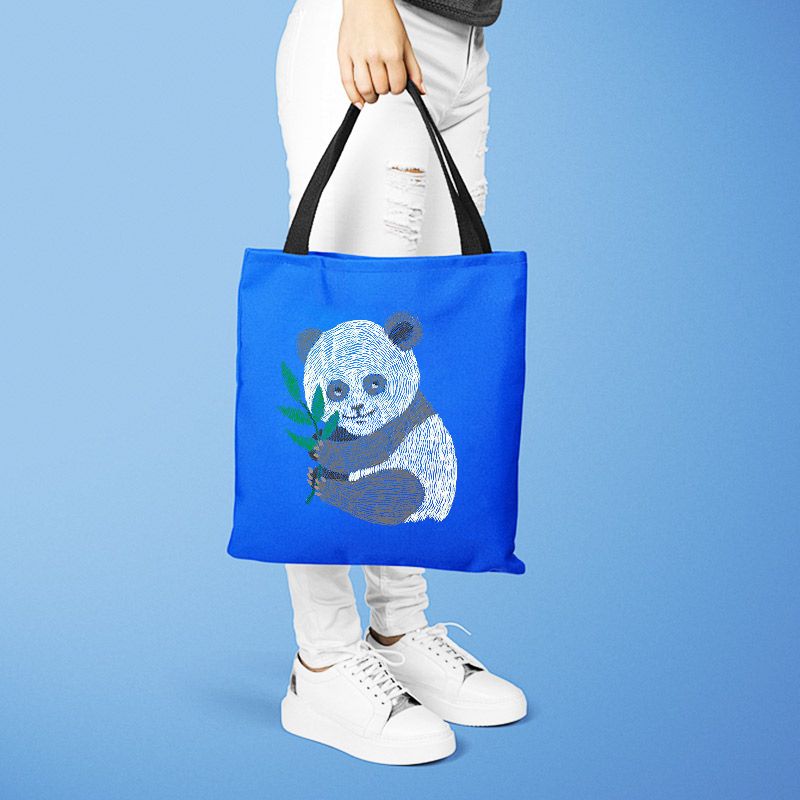 Simulated embroidery pattern of a panda printed on a tote bag using UV technology, ideal for cultural creative and gift customization industries.