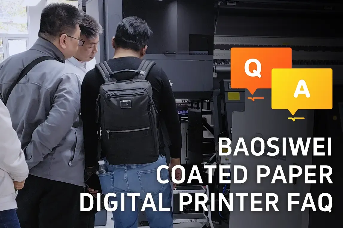 Visitors viewing a Baosiwei coated paper digital printer at an exhibition, with "Q/A" icons and "BAOSIWEI COATED PAPER DIGITAL PRINTER FAQ" text.
