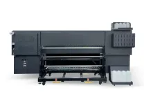 Mặt sau của máy in thăng hoa thuốc nhuộm Baosiwei với hệ thống nạp và thu hai trục, hỗ trợ cuộn giấy dài tới 10.000 mét.