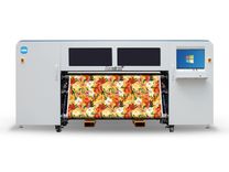Front view of Baosiwei 1.9m dye sublimation printer printing full-coverage floral pattern on textile fabric