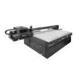 Side view of Baosiwei 2.5m × 1.3m Visual Positioning UV Flatbed Printer, designed with a cannon-style visual positioning system for automatic alignment and precise image registration